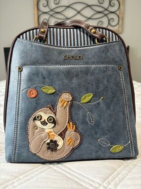 Chala Blue Faux Leather Sloth Satchel with Brown Trim and Green/Orange Accents